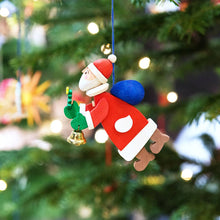 Carica l&#39;immagine nel visualizzatore di Gallery, Decorazione in legno Babbo Natale con campanellino Graupner Holzminiaturen
